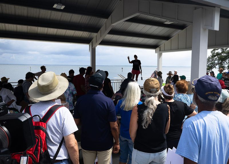 "No Kings" demonstrators muster at Carl Gray Park in Panama City, Fla., June 14, 2025. The nationwide protest coincides with President Donald Trump's 79th birthday and the U.S. Army's 250th Birthday Parade outside the White House in Washington. (Tyler Orsburn/News Herald)