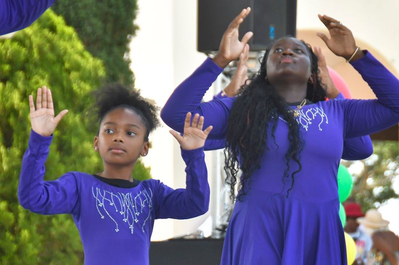 A performance by members of the Metropolitan Baptist Church in Cocoa. The 2025 Juneteenth Arts & Cultural Celebration at Cocoa Riverfront Park. The free event featured live music, vendors, food trucks, arts & crafts, a bounce house, and a gospel hour.