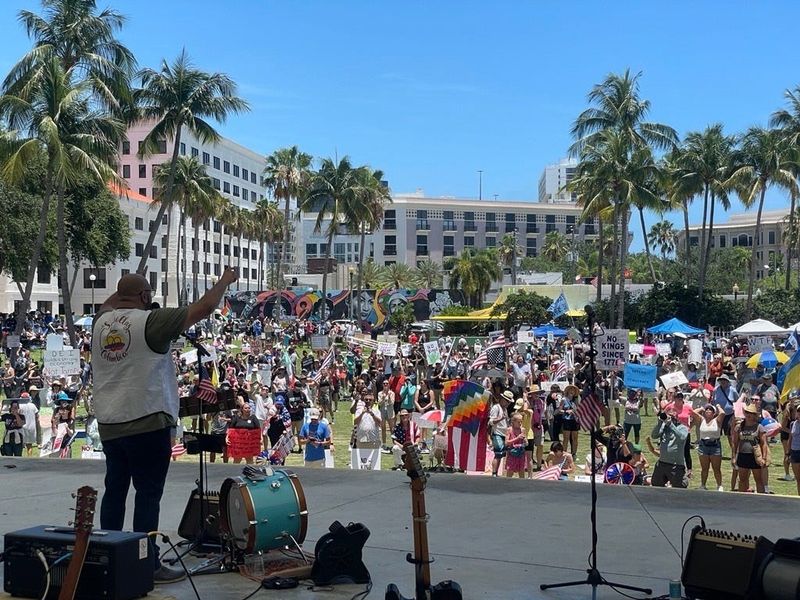 The crowd gathers at the stage of the Meyer Amphitheatre in West Palm Beach on June 14, 2025, for the 'No Kings' rally in protest of President Donald Trump's policies.