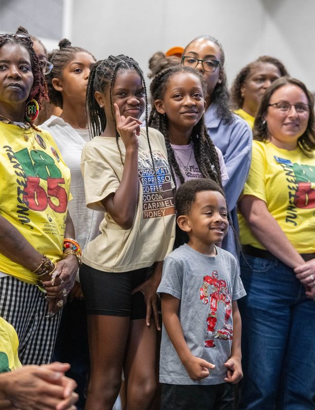 Everyone gathers for a group photo during the Juneteenth celebration, presented by the Black Employees Association, at the University of West Florida in Pensacola on June 16, 2025.