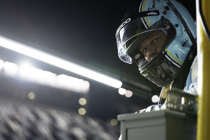 Brad Pitt gets behind the wheel of a Formula 1 car in the racing film "F1: The Movie."