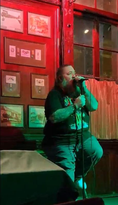 Nick Wing sings during a karaoke night in Pensacola. Wing died June 17 in a car crash in Escambia County.
