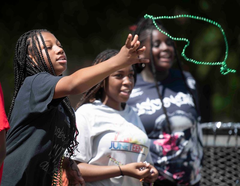 The Martin Luther King, Jr. parade, rescheduled from January, winds through the streets of downtown Pensacola on June 19, 2025.
