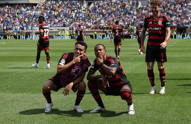 Flamengo forward Wallace Yan (64) celebrates scoring a goal with teammates in a match against Chelsea during a group stage match in the 2025 FIFA Club World Cup at Lincoln Financial Field.