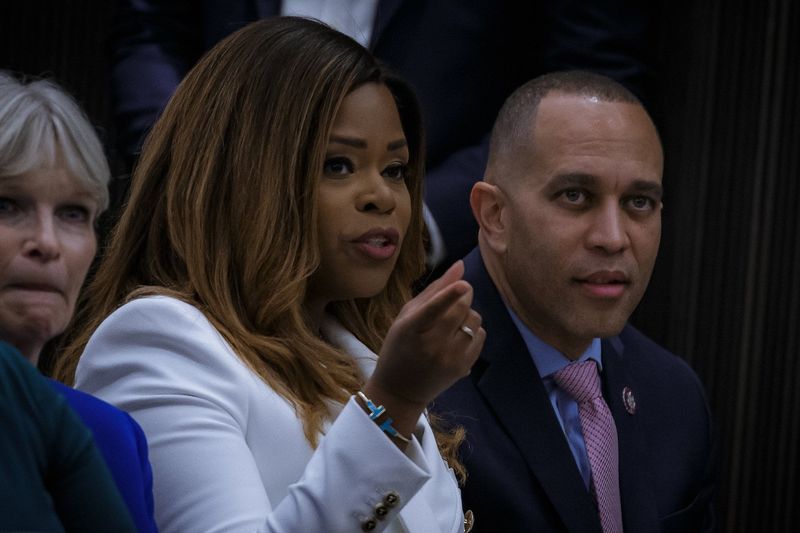 U.S. Rep. Sheila Cherfilus-McCormick, seen here with House Minority Leader Hakeem Jeffries in West Palm Beach in February 2023, says the federal government's actions against Haitians living in the U.S. will lead to 'a collapse' of South Florida's economy.