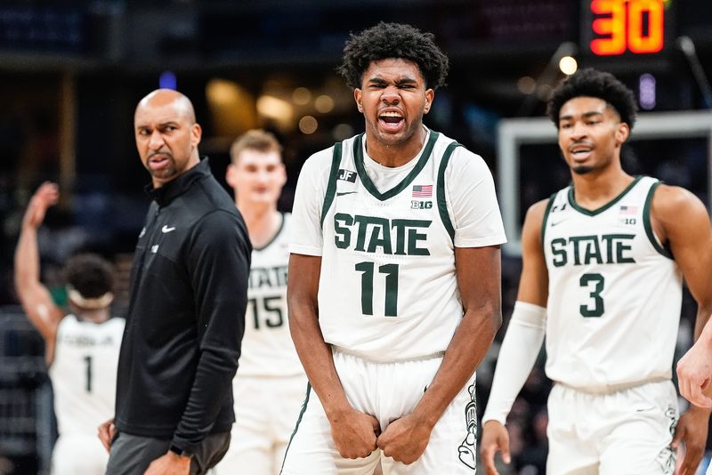 Michigan State guard Jase Richardson (11) celebrates a three point basket against Oregon during the first half of Big Ten Tournament quarterfinal at Gainbridge Fieldhouse in Indianapolis on Friday, March 14, 2025.