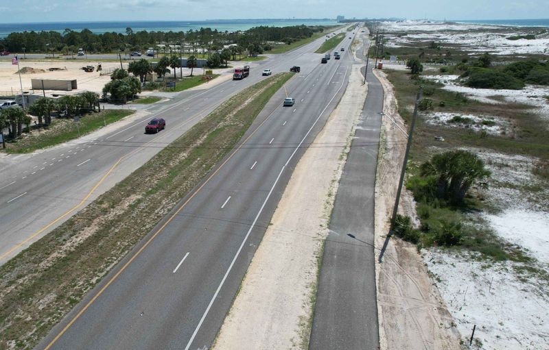 In this photo the bridge-to-bridge path can be seen on the south side of U.S. Highway 98. It is expected to be complete by August of 2025.