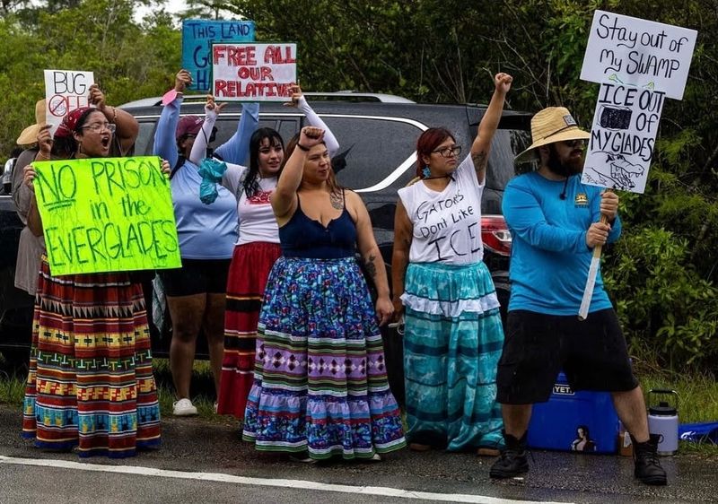 Aimee Osceola, center, and hundreds of other people protested against the development of an immigration detention center, dubbed "Alligator Alcatraz," in Big Cypress National Preserve, on June 22, 2025.