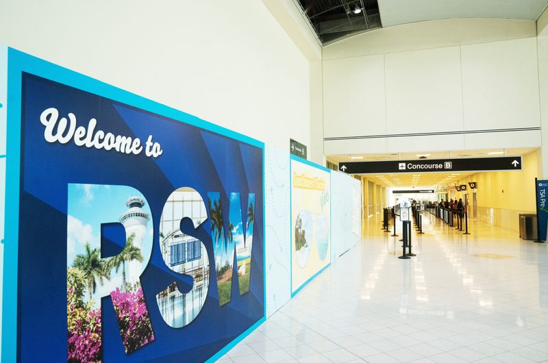 Passengers stroll through the concourse at Southwest Florida International Airport Friday, June 20, 2025. RSW is expanding its footprint. Concourse E is under construction.