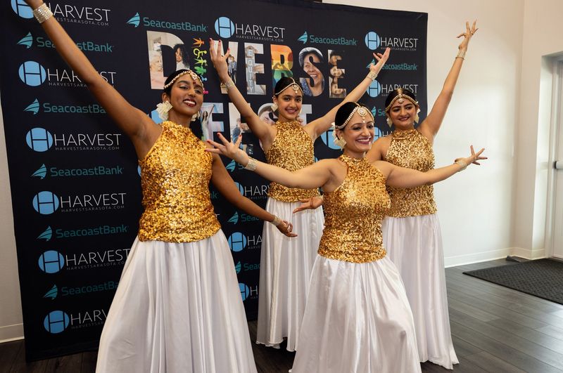 The MIDAS Dancers from the Indian Association of Manatee & Sarasota reach out during a performance at the third annual Diverse Fest.