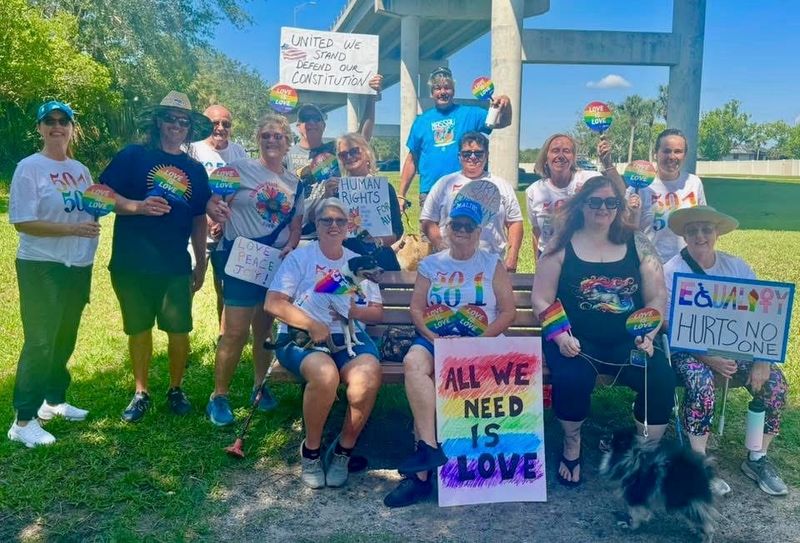 Participants gather at the Flagler 50501 Pride Walk earlier in June.