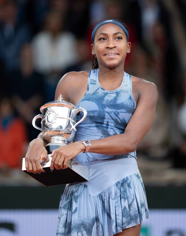 Jun 7, 2025; Paris, FR; Coco Gauff of the United States poses with the trophy after winning the women’s singles final against Aryna Sabalenka on day 14 at Roland Garros Stadium. Mandatory Credit: Susan Mullane-Imagn Images