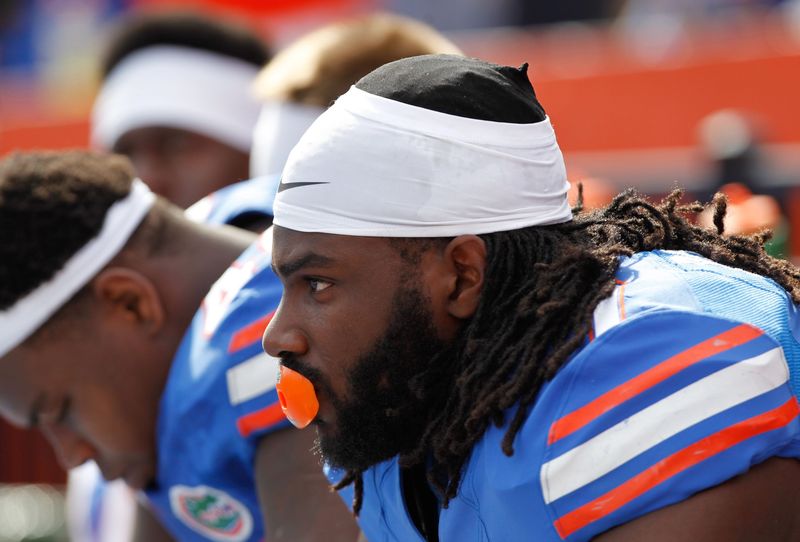 Nov 9, 2013; Gainesville, FL, USA; Florida Gators linebacker Ronald Powell (7) on the bench against the Vanderbilt Commodores during the first quarter at Ben Hill Griffin Stadium. Mandatory Credit: Kim Klement-USA TODAY Sports