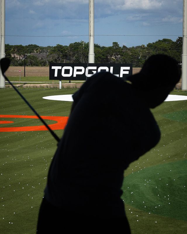 People are seen at TopGolf in Panama City Beach, Fla., June 27, 2025. (Tyler Orsburn/News Herald)