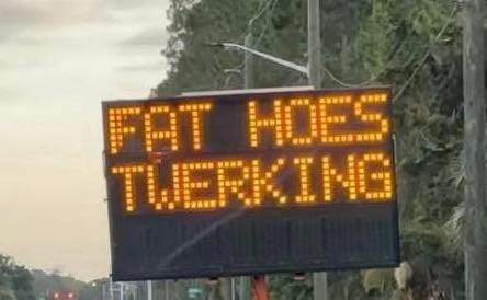 A road sign on Seminole Woods Boulevard in Palm Coast displayed the phrase "fat hoes twerking" during part of Monday morning, June 30, 2025.