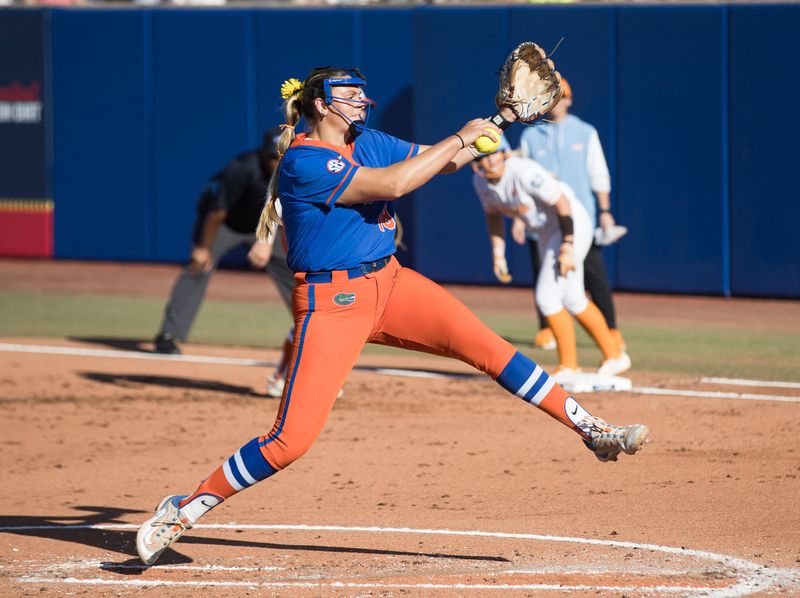 May 30, 2025; Oklahoma City, OK, USA; Florida Gators pitcher Kara Hammock (18) throws a pitch during the first inning against the Tennessee Lady Volunteers during the NCAA Softball Women's College World Series at Devon Park. Mandatory Credit: Brett Rojo-Imagn Images