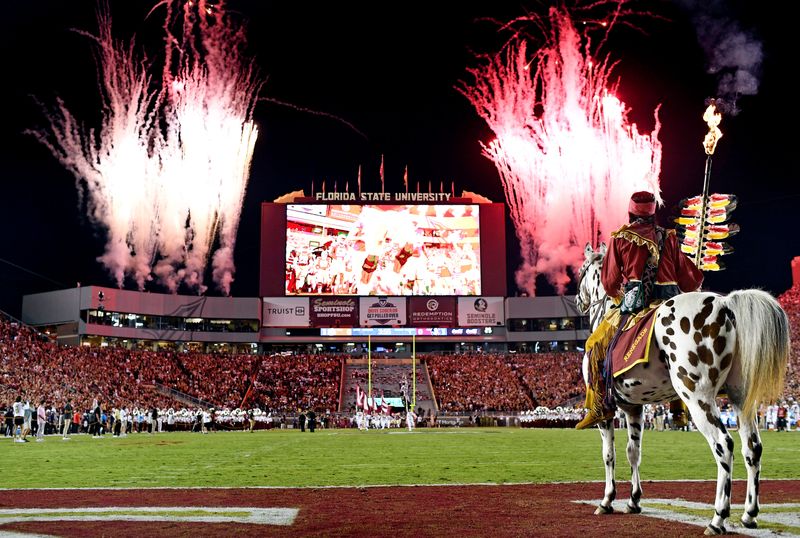 Oct 15, 2022; Tallahassee, Florida, USA; Florida State Seminoles symbols Osceola and Renegade watch as the team come out of the tunnel before a game against the Clemson Tigers at Doak S. Campbell Stadium. Mandatory Credit: Melina Myers-USA TODAY Sports