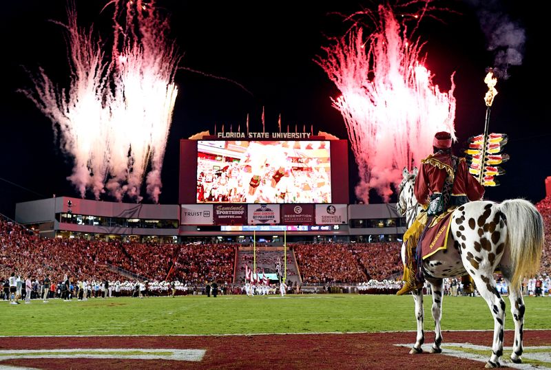 Oct 15, 2022; Tallahassee, Florida, USA; Florida State Seminoles symbols Osceola and Renegade watch as the team come out of the tunnel before a game against the Clemson Tigers at Doak S. Campbell Stadium. Mandatory Credit: Melina Myers-USA TODAY Sports
