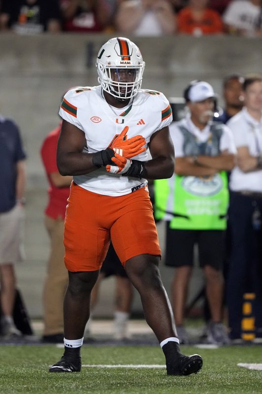 Oct 5, 2024; Berkeley, California, USA; Miami Hurricanes defensive lineman Rueben Bain Jr. (4) during the first quarter against the California Golden Bears at California Memorial Stadium. Mandatory Credit: Darren Yamashita-Imagn Images