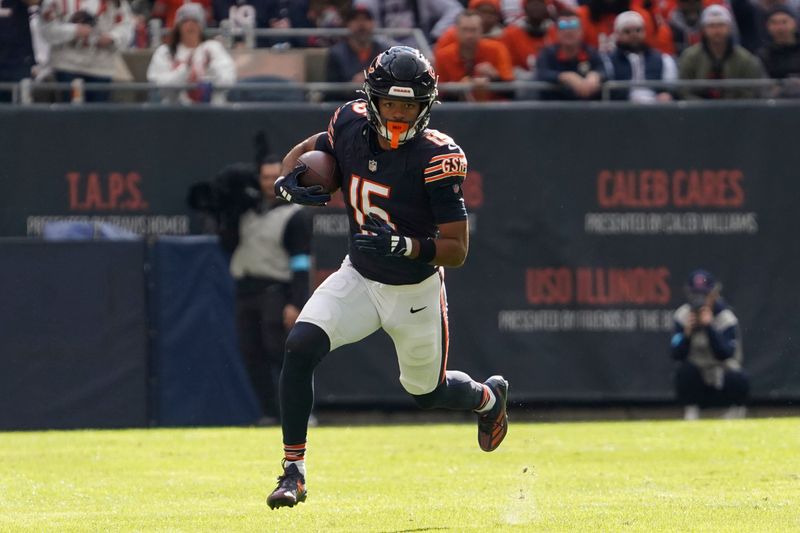 Nov 10, 2024; Chicago, Illinois, USA; Chicago Bears wide receiver Rome Odunze (15) catches a pass and runs against the New England Patriots during the first half at Soldier Field. Mandatory Credit: David Banks-Imagn Images