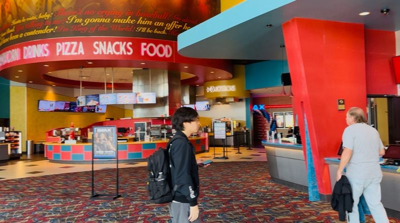 Moviegoers in the lobby of the CMX Daytona Luxury 12 Theatres at One Daytona in Daytona Beach on Tuesday, July 1, 2025.