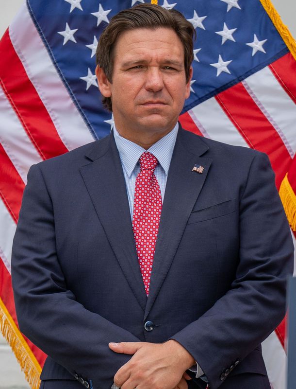 Gov. Ron DeSantis stands outside the Jefferson County Courthouse in front of an American flag after unveiling a statue of Thomas Jefferson on Wednesday, July 2, 2025.