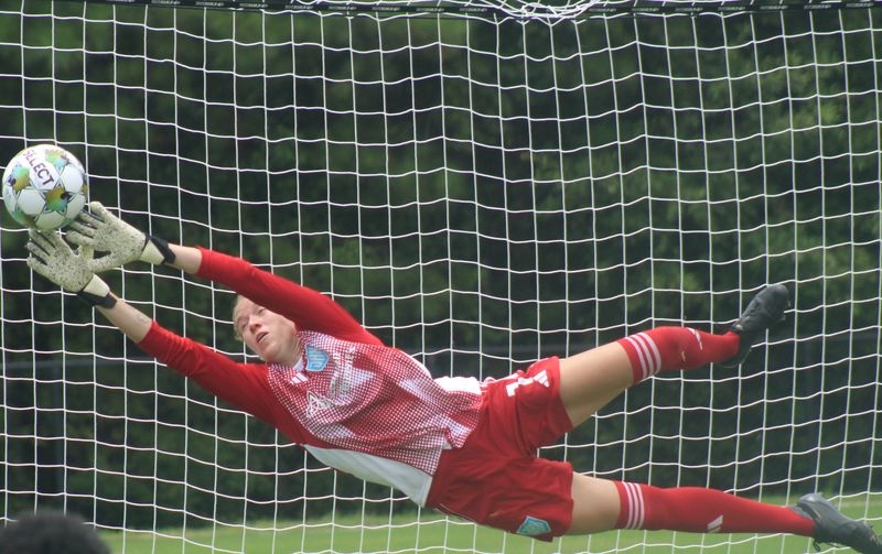 Sporting Jax goalkeeper Jamie Gerstenberg (1) dives to save a shot during Media Day at Episcopal School of Jacksonville's Knight Sports Complex on July 2, 2025. [Clayton Freeman/Florida Times-Union]