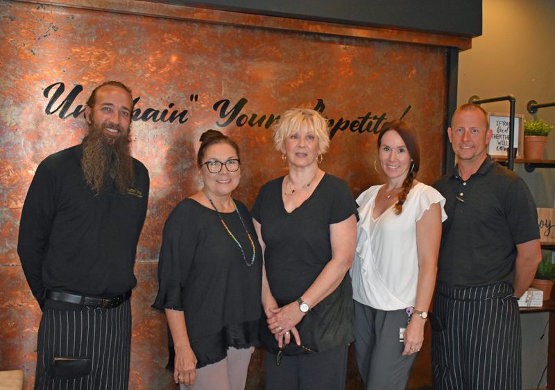 Tuscany Grill in Viera is Brevard County's first designated "dementia-friendly dining" location, with staff trained to serve the dining needs of those with dementia. From left are Matthew Mcateer, owner Gina Pierce, Cindy Alexander and Christine Guadalupe, general manager.
