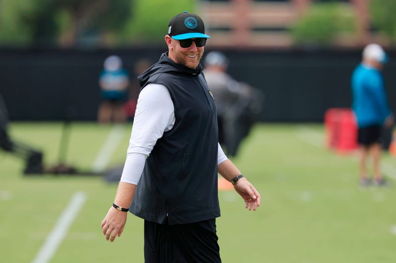 Jacksonville Jaguars head coach Liam Coen looks on during a rookie minicamp at Miller Electric Center Saturday, May 10, 2025 in Jacksonville, Fla. [Corey Perrine/Florida Times-Union]