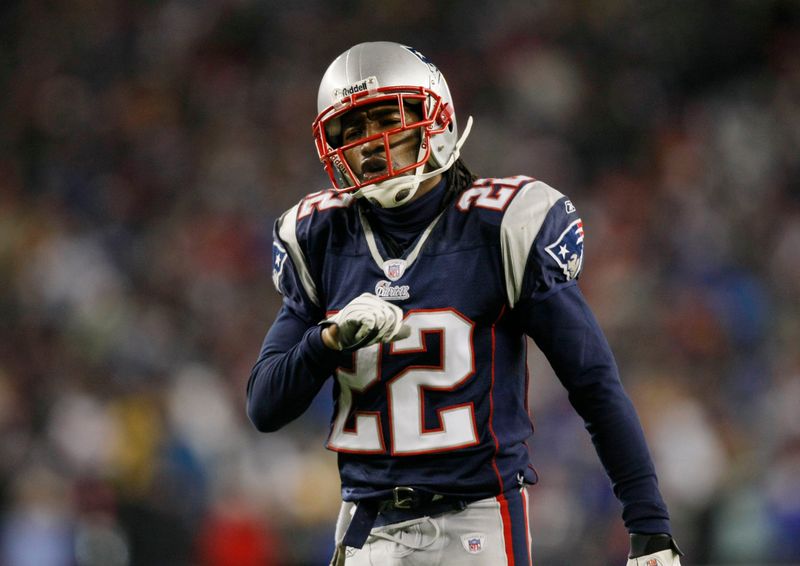 Jan 20, 2007; Foxborough, MA, USA; New England Patriots cornerback Asante Samuel (22) reacts in the second half against the San Diego Chargers during the AFC Championship game at Gillette Stadium. New England won the game 21-12. Mandatory Credit: David Butler II-USA TODAY Sports