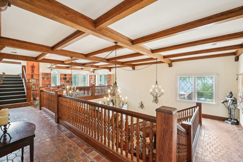 A view of the staircase of Pillars Castle from a master bathroom located on the second floor. The house is on the market for $1,695,000.