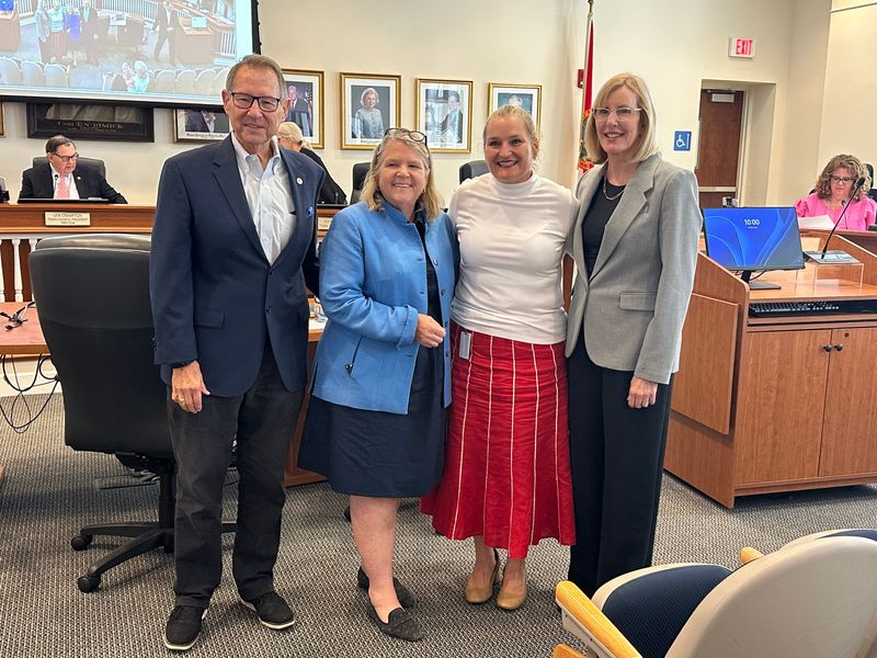 Citizens' Association of Palm Beach Co-Chair Skip Aldridge (from left), Palm Beach Mayor Danielle Moore, Palm Beach design and preservation manager Friederike Mittner and Palm Beach Civic Association media specialist Sally Lewis celebrate scholarships awarded to the children of town staff by local nonprofits at the Town Council's July 8 meeting in Palm Beach.