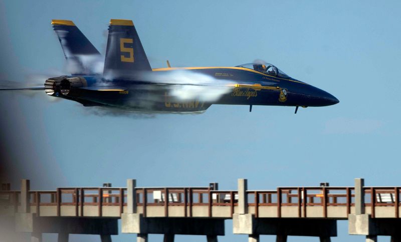 The Blue Angels take to the skies over Santa Rosa Island for "Breakfast with the Blue" in July 2025. The circles and arrivals event kicks off the annual Red, White, and Blues week at Pensacola Beach.