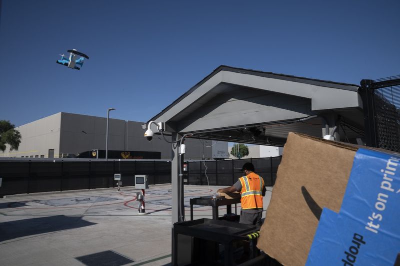 A drone takes off for a package delivery on the launch pad at Amazon's fulfillment center in Tolleson, Arizona, on July 9, 2025.