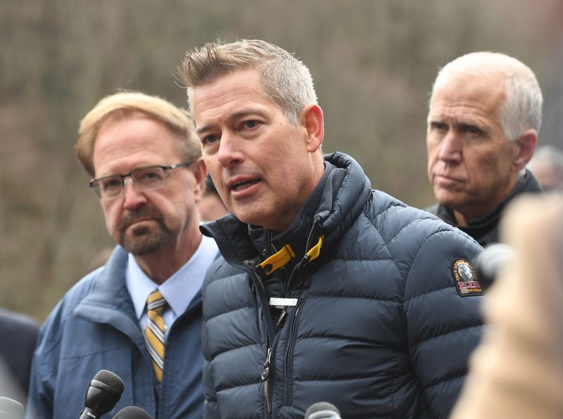 The U.S. Secretary of Transportation Sean Duffy, center, visited North Carolina's on Feb. 10, 2025 to view the damage done to I-40 near Asheville by Hurricane Helene.