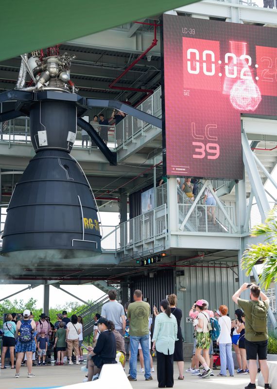 Visitors to Kennedy Space Center, Florida take a look at a simulated static test fire of a J-2 rocket engine at The Gantry at LC-39, a new exhibit at the Kennedy Space Center Visitor Complex July 10, 2025. Craig Bailey/FLORIDA TODAY via USA TODAY NETWORK