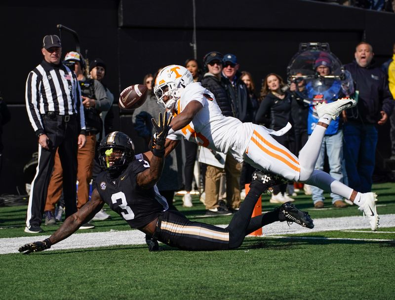 Tennessee defensive back Jermod McCoy (3) breaks up a pass intended for Vanderbilt wide receiver Quincy Skinner Jr. (3) during the first quarter at FirstBank Stadium in Nashville, Tenn., Saturday, Nov. 30, 2024.