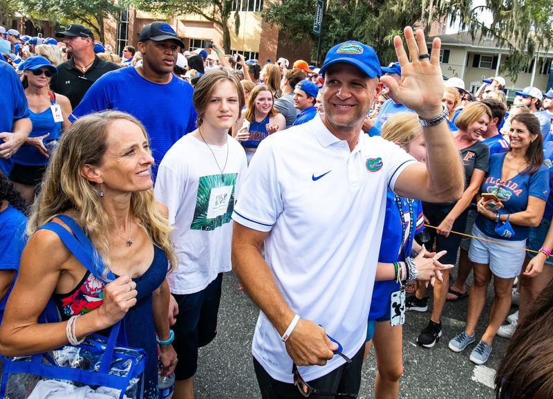 Heisman Trophy Winner Danny Wuerffel waves to Gator fans while arriving with family, friends and former Gators before the Florida Gators arrived for Gator Walk as they were greeted by fans before playing the Tennessee Volunteers Saturday September 25, 2021 at Ben Hill Griffin Stadium in Gainesville, FL. [Doug Engle/GainesvilleSun]2021

Flgai 092521 Gatorsvsvolsgatorwalk