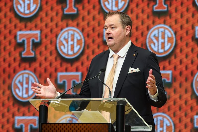 July 15, 2025; Atlanta, GA, USA; Tennessee Volunteers head coach Josh Heupel talks to the media during SEC Media Days at Omni Atlanta Hotel.