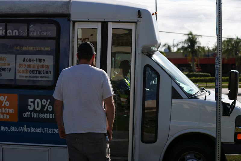 Christopher Trout, of Port Salerno. gets on a Community Coach bus at the Cove Road and U.S. 1 bus stop, Thursday, July 10, 2025, in Martin County. Martin County Public Transit (MARTY) has a limited fixed route service as the Senior Resource Association of Vero Beach tries to get insurance for MARTY. MARTY is operating with Senior Resource, Community Coach and Indiantown Shuttle vehicles.