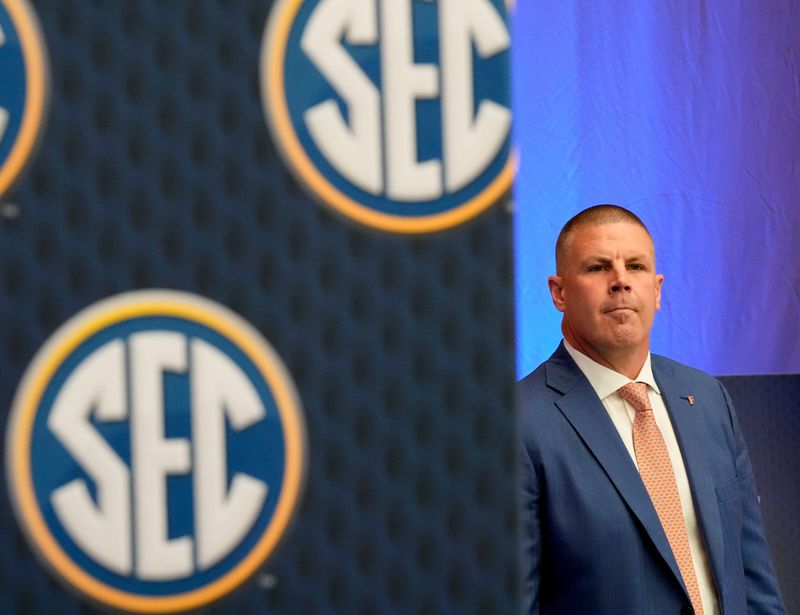 July 16, 2025; Atlanta, GA, USA; Florida head coach Billy Napier waits off stage to be introduced during SEC Media Days at the College Football Hall of Fame in Atlanta.
