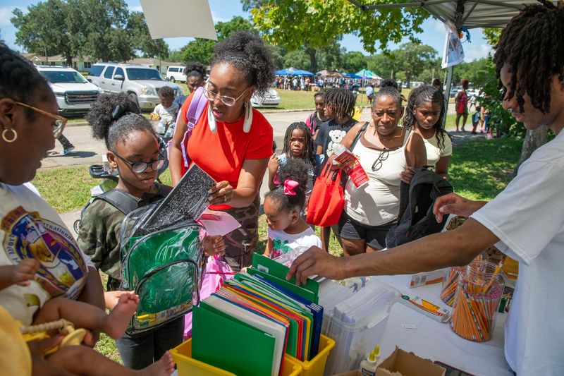 Kids received free school supplies during the Community Vision Back to School Summer Bash in July 2025 at Lexington Terrace Park. This year's Community Vision school supply giveaway is set for July 25 at the park. Several other organizations are also holding school supply giveaways in July and August.