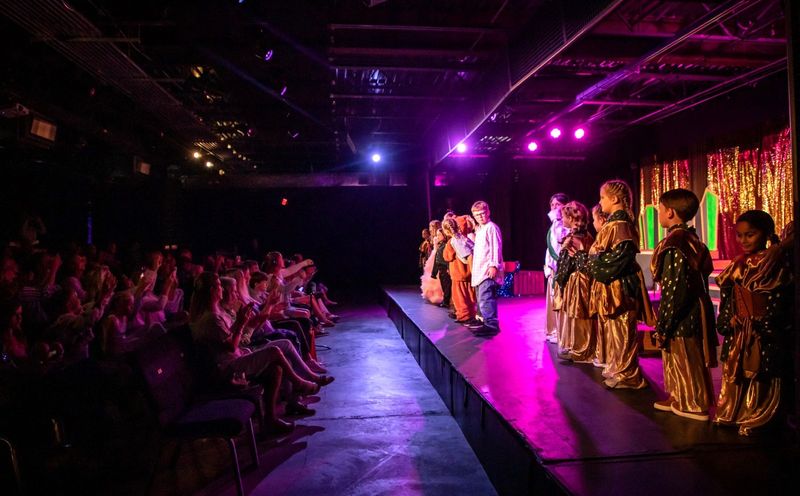 Young actors take the stage as part of the Emerald Coast Theatre Company.