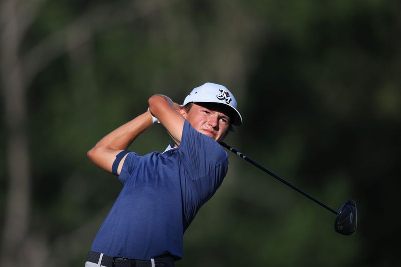 Miles Russell tees off on the ninth hole during the first round of stroke play of the 2025 U.S. Junior Amateur at Trinity Forest Golf Club in Dallas, Texas on Monday, July 21, 2025. (Dustin Satloff/USGA)