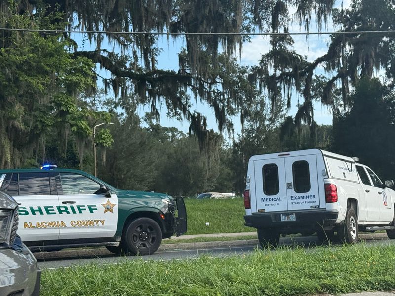Officials work the scene of a fatal crash in the 5000 block of Southwest Archer Road on July 23, 2025, in Gainesville.