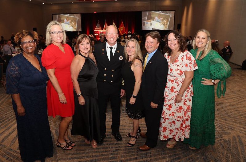 Alachua County Fire Rescue Chief Harold Theus, center, was named the 2025 Career Fire Chief of the Year at the Florida Fire Chiefs’ Association Executive Development Conference in Miami.
