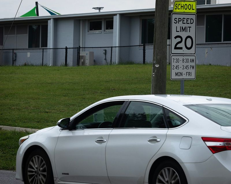 A car drives past Palm Bay Elementary School in Panama City, Fla., July 23, 2025. (Tyler Orsburn/News Herald)