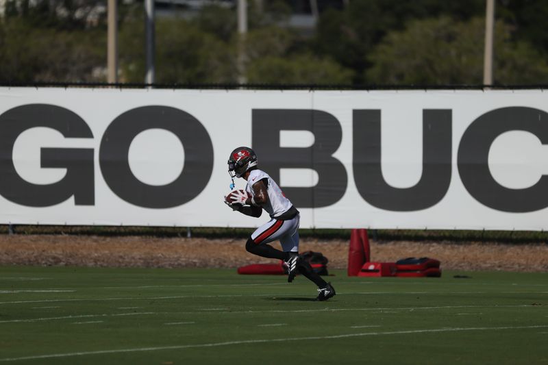 Jun 11, 2025; Tampa, FL, USA; Tampa Bay Buccaneers wide receiver Emeka Egbuka (9) works out at One Buc Place. Mandatory Credit: Kim Klement Neitzel-Imagn Images