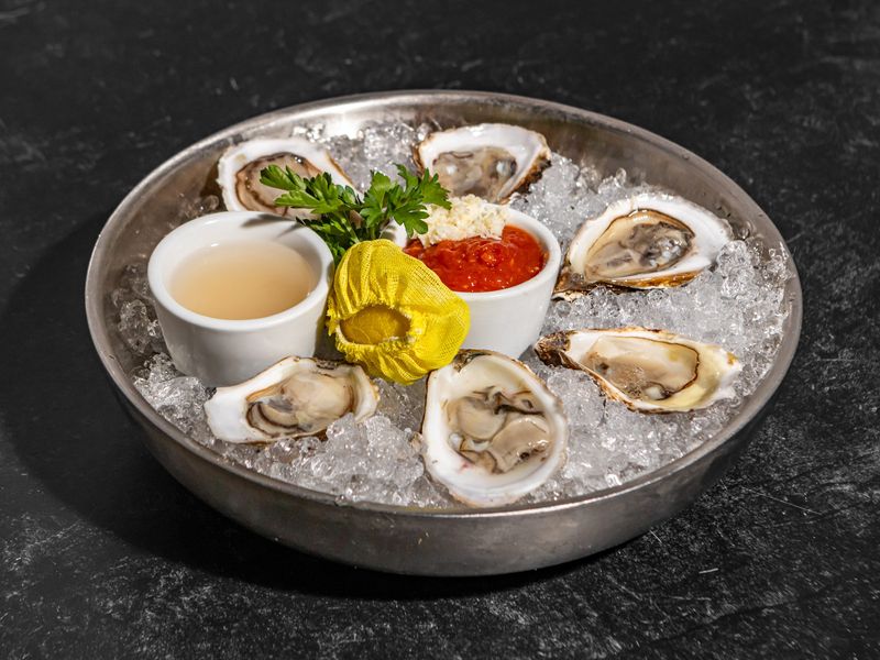 Corvina Seafood Grill in Boca Raton will offer chilled oyster bloody mary "shooters" and 50% of oysters from their menu on National Oyster Day.
