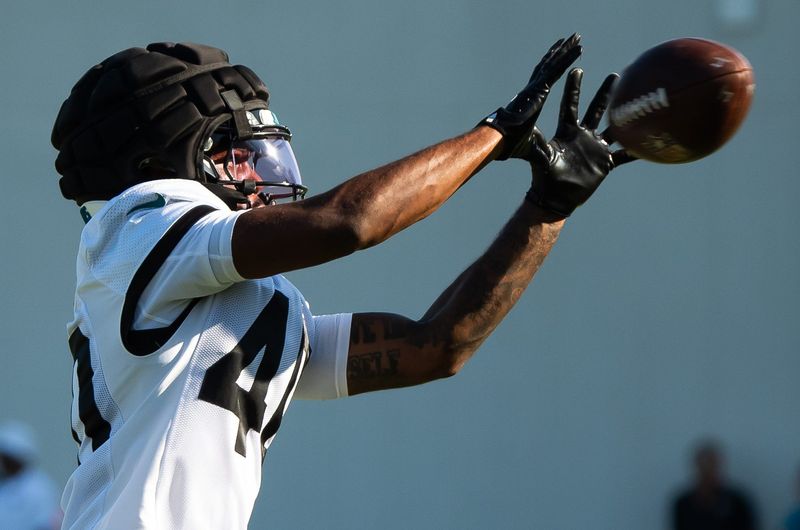 Jacksonville Jaguars cornerback Aydan White (40) hauls in a pass during a drill during an NFL training camp fourth session at the Miller Electric Center, Sunday, July 27, 2025, in Jacksonville, Fla. [Doug Engle/Florida Times-Union]